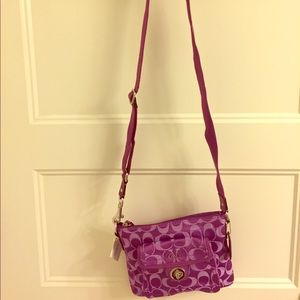 Never been used Coach cross-body purse