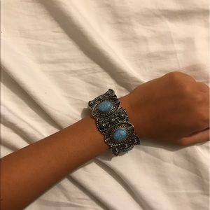 Silver and blue bracelet. From icing