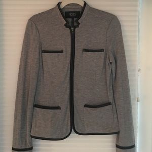 Gray blazer-style jacket with a zipper.