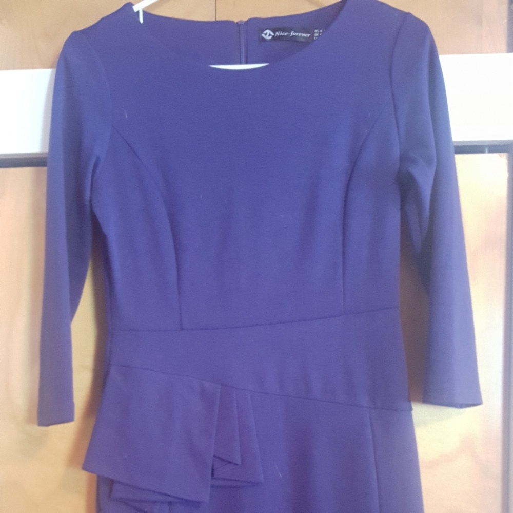3/4 length dark blue dress. Worm once to a wedding