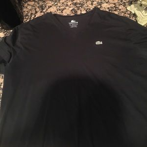 Lacoste size 7 (L) v neck black