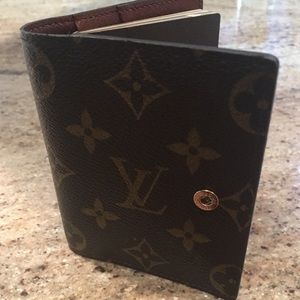 Louis Vuitton small address book.