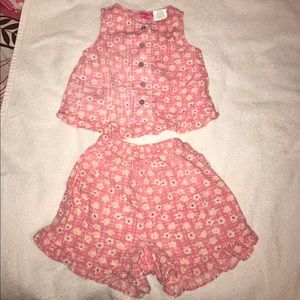 Two two piece shirts and shorts