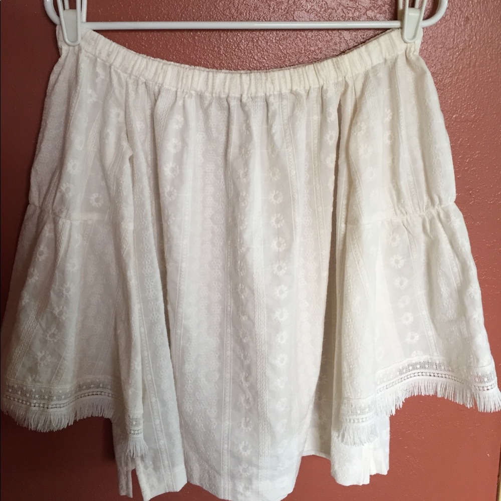 white embroidered off the shoulder top
