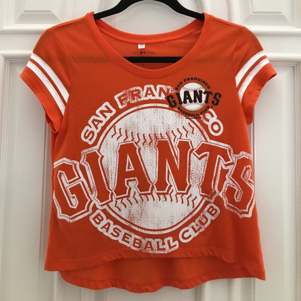 SF Giants orange and black logo t-shirt.
