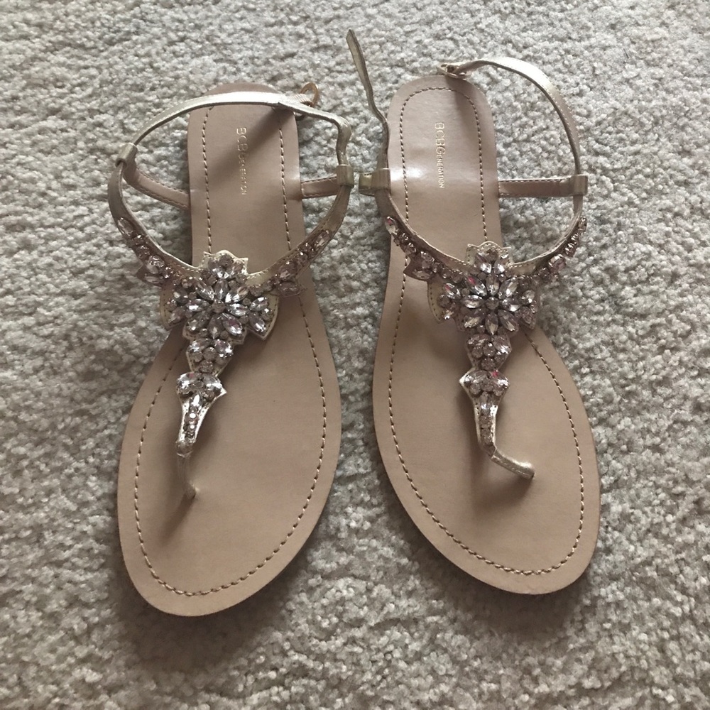 BCBG Generation gold embellished flat sandal.