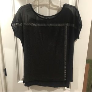 Black partial sheer top with faux leather accent