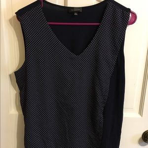 Navy and white polka dot sleeveless shirt
