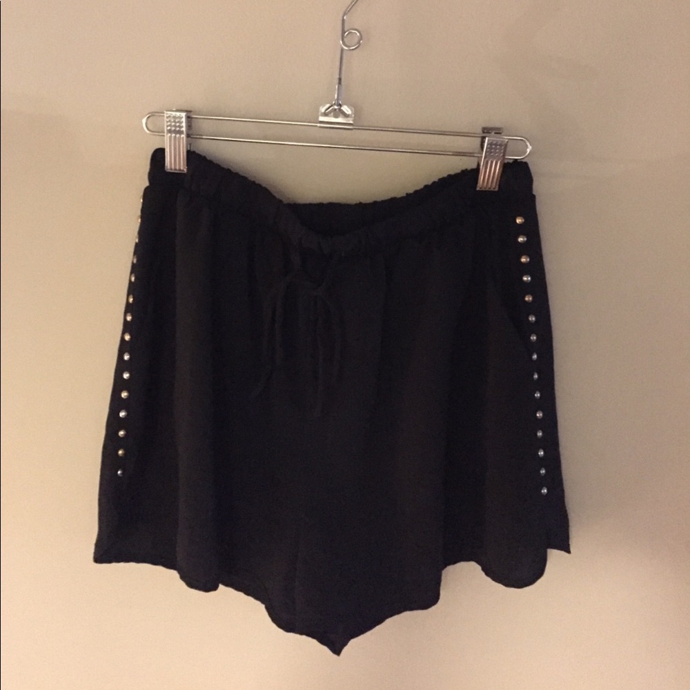 Black shorts with gold studs
