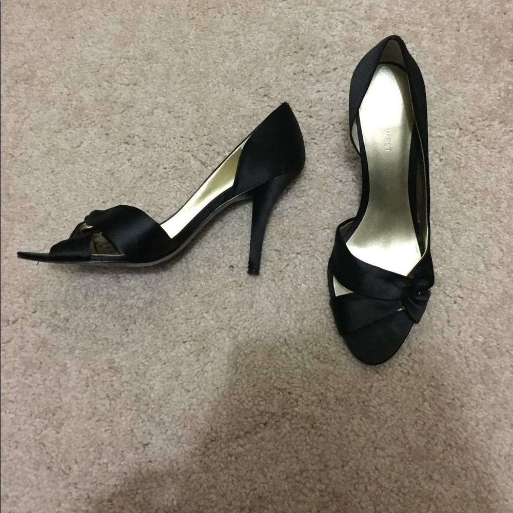 Black satin pumps