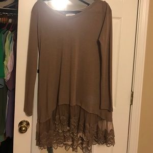 can be worn as a dress or shirt