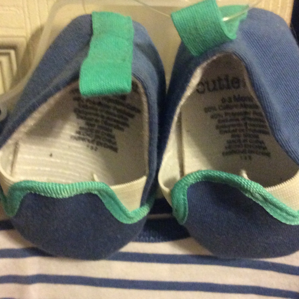 A onesie with shoes onesie and shorts