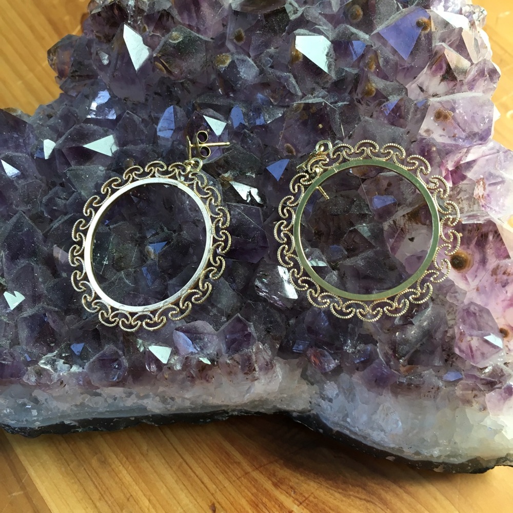 Gold hoop earrings with scalloped edge