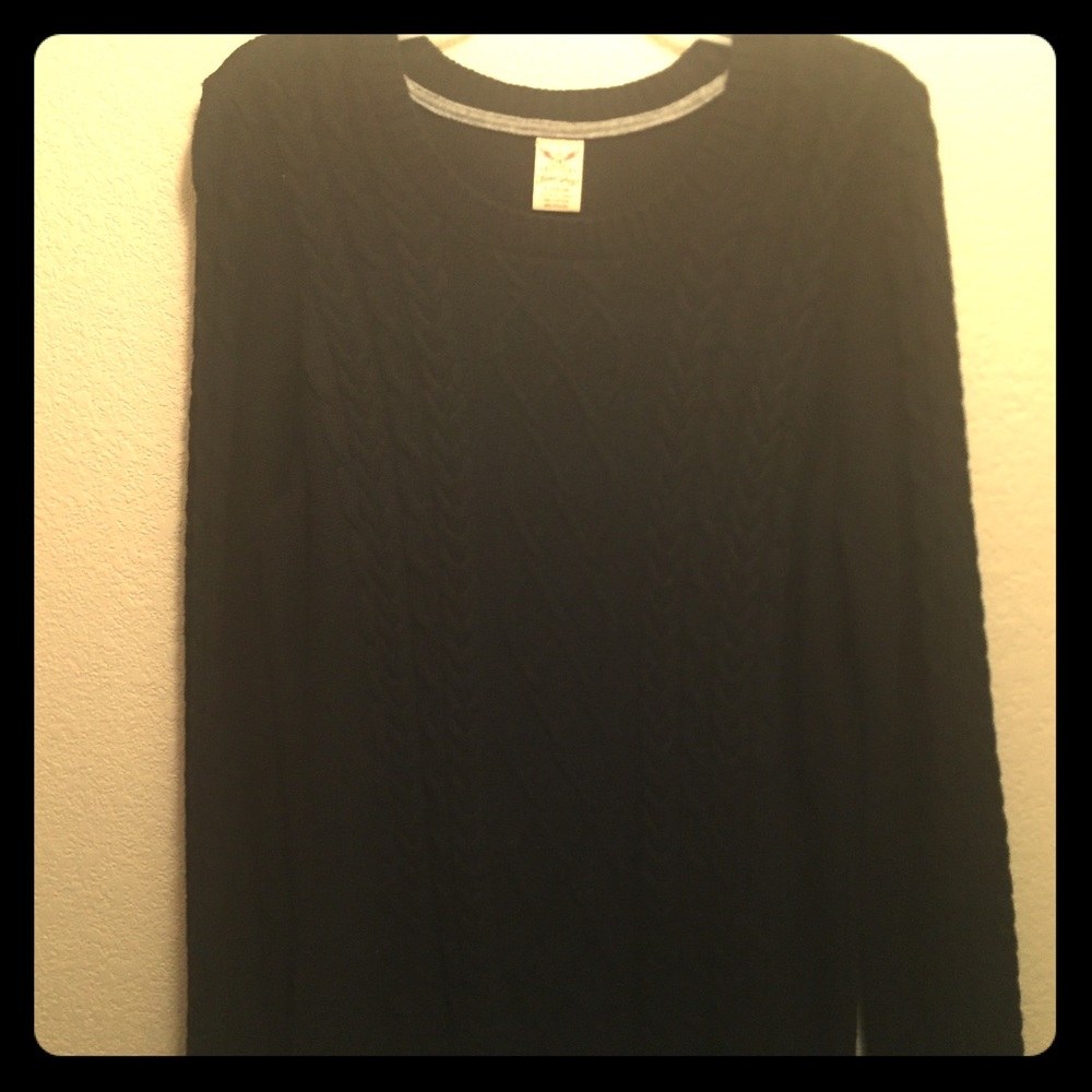 Knitted sweater.