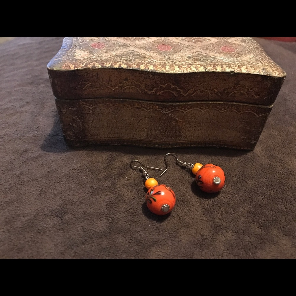 Orange beaded hanging earrings, silver hooks
