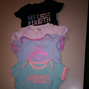 Bundle of 4 onesies