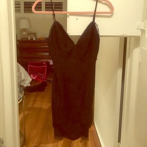 Black lace mini dress tags on