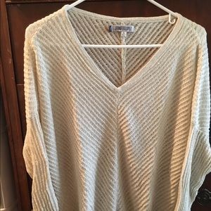 Sheer, light sweater blouse.