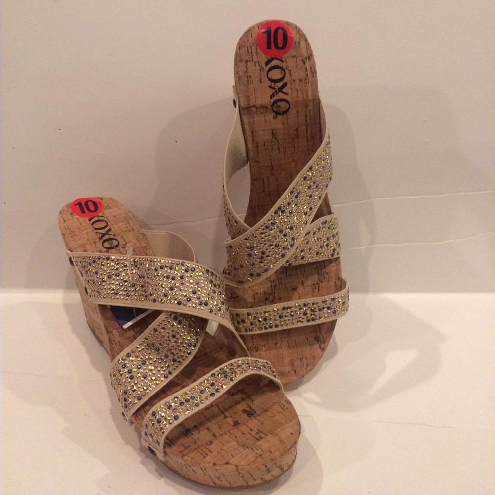 Cork wedge mules with an added bling.