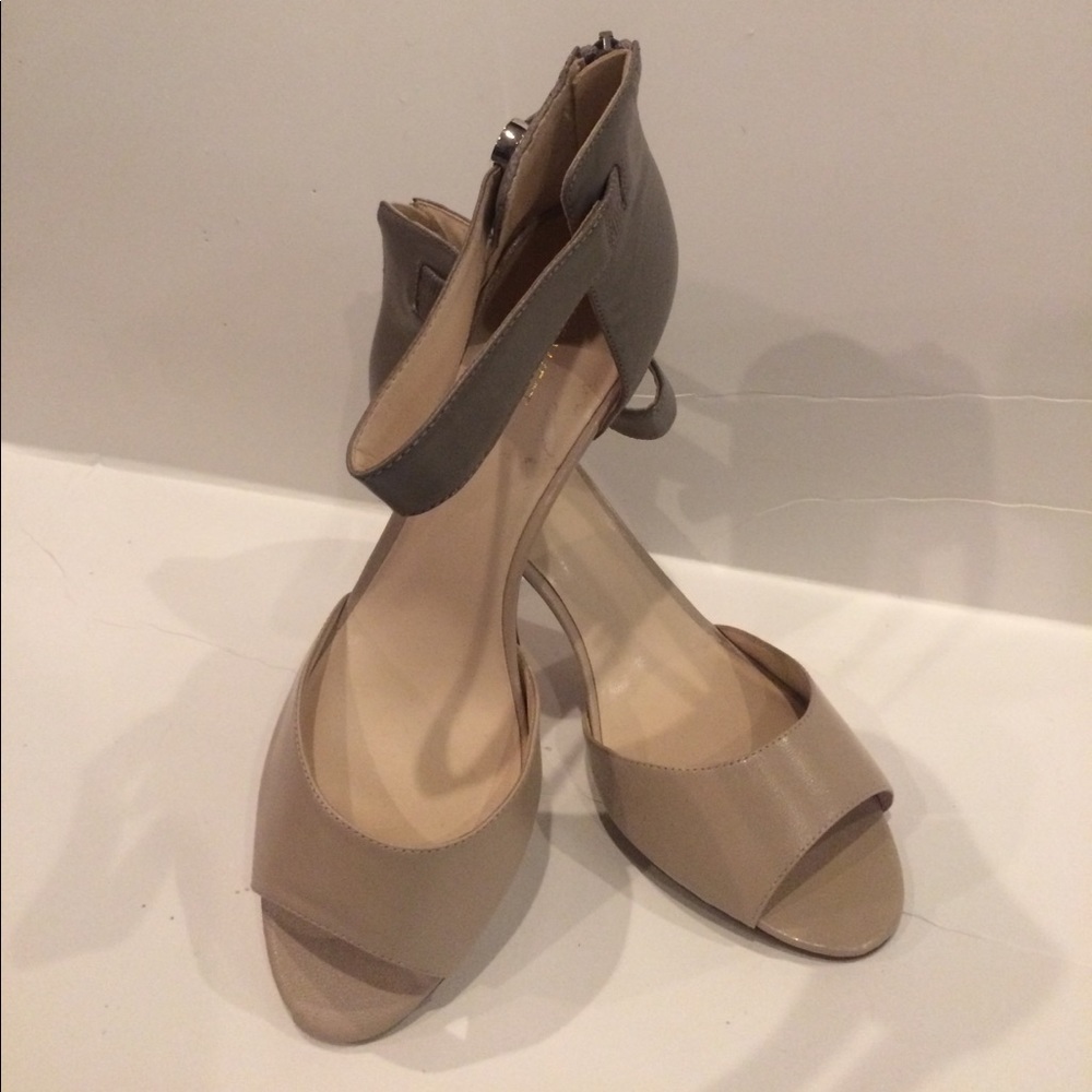 Taupe and tan ankle strap heals.