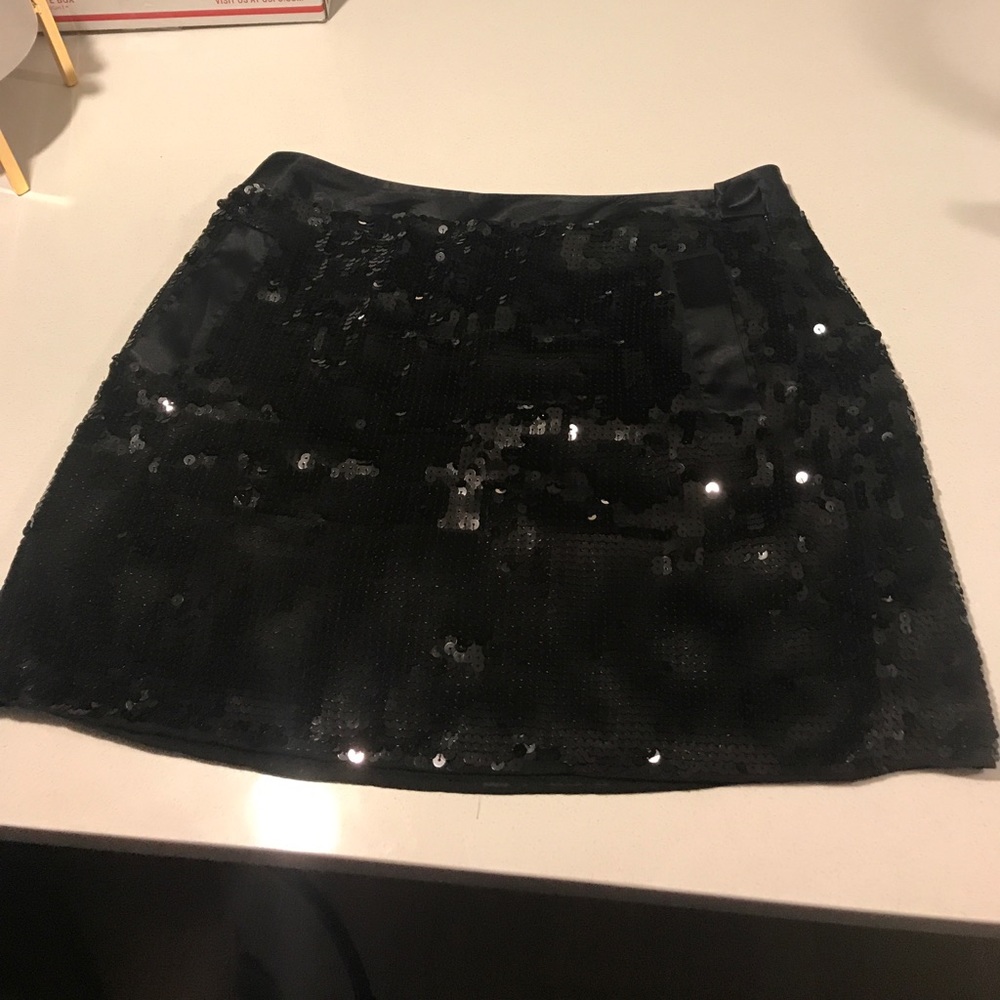 Black sequin mini skirt