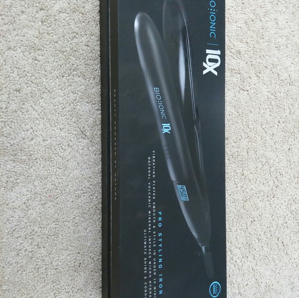 Cosmetologist using GHD instead