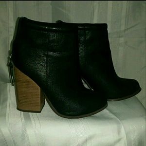 Black booties with brown heel