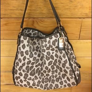 Authentic Coach animal print handbag..