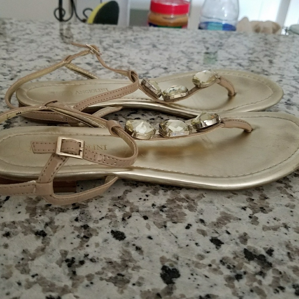 Gold sandals by Enzo Angiolini
