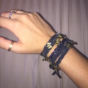 Navy leather wrap bracelet with gold bows