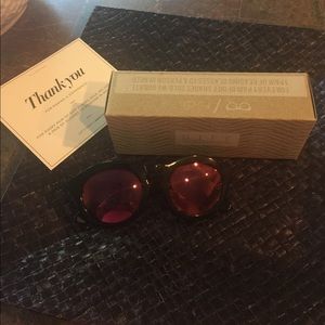 Diff Dime black frame sunglasses.