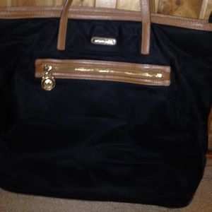 Michael Kors black large handbag.