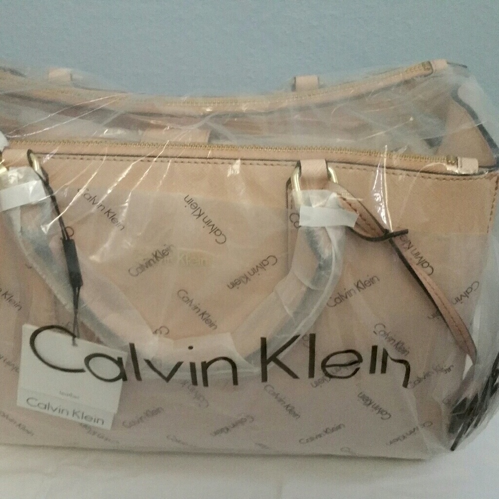 SOLD - Calvin Klein Saffiano Flower charm