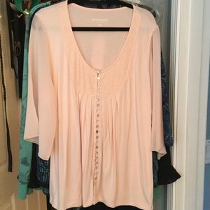 Pink shirt with lace accents