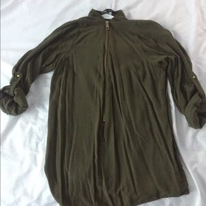Army green zip up shirt. Up to your elbows.