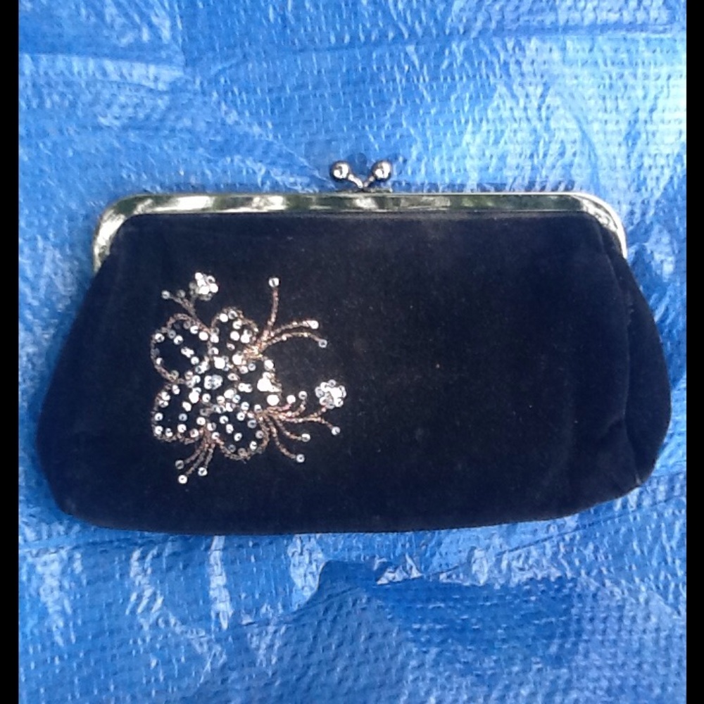 Black Express kiss lock clutch