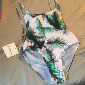 One piece criss cross leaf print bathing suit