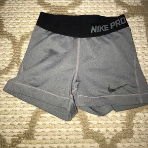 gray and black nike pro
