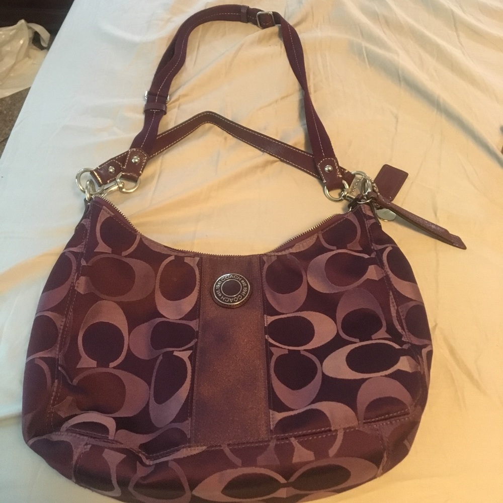 Large Purple coach purse that is lightly used