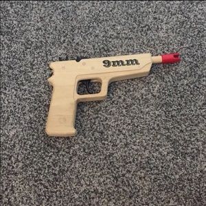 Wooden rubber band gun