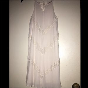 Sleeveless off-white straight dress