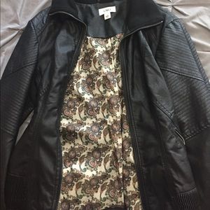 Black "leather" jacket.