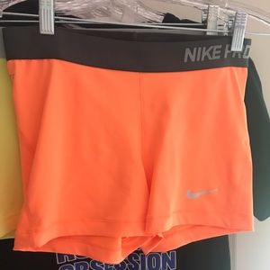 Orange Nike Pros