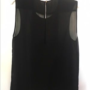 See-through ruffled blouse