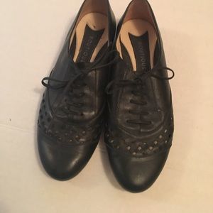 Black lace up perforated saddle shoes