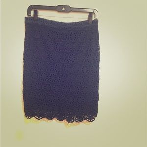 Navy color lace skirt.