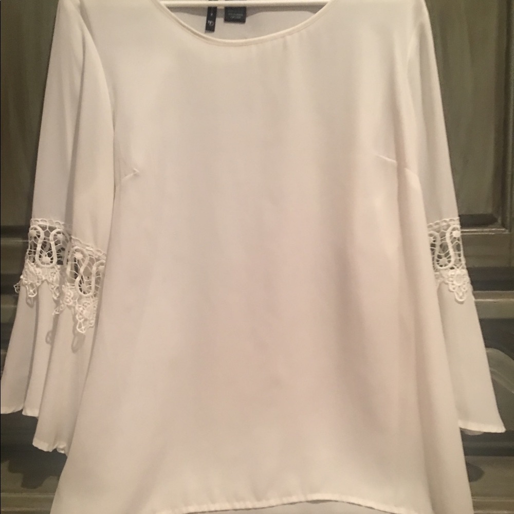 Size lg bell sleeve blouse cream color