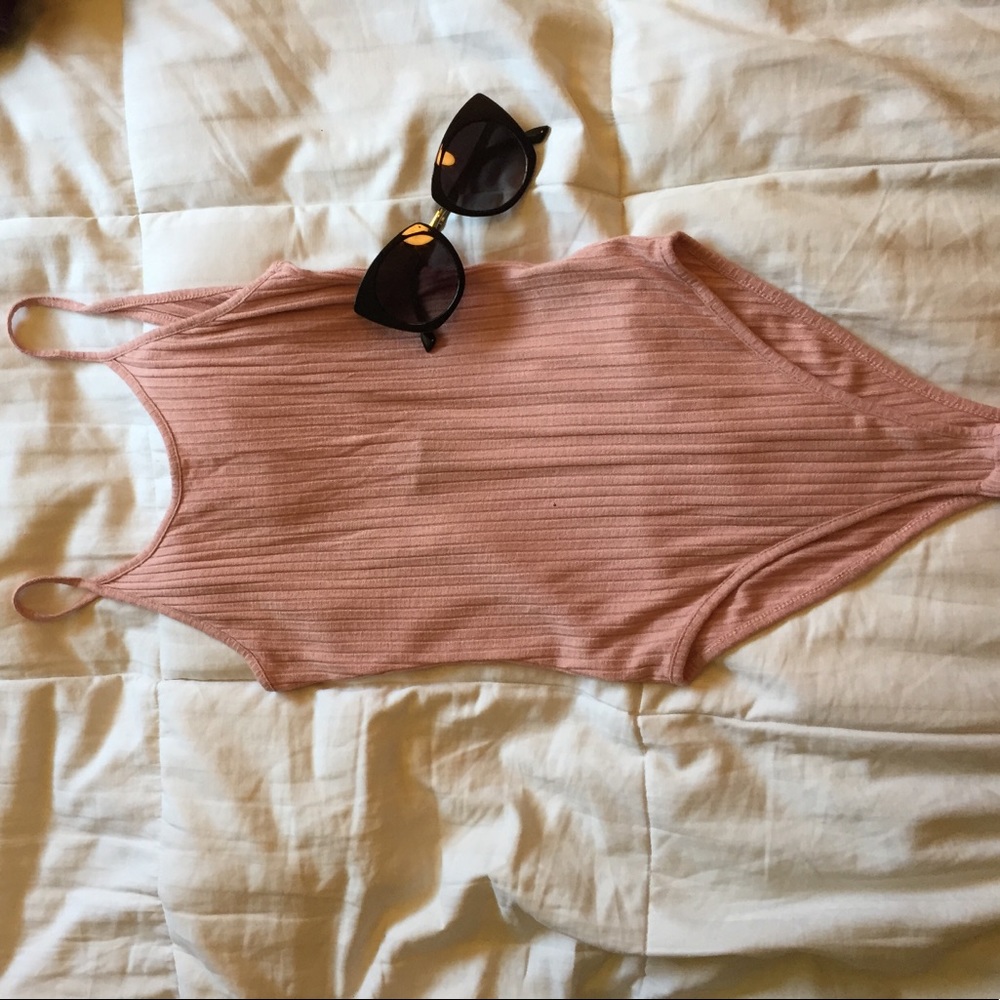 Pink bodysuit with low back