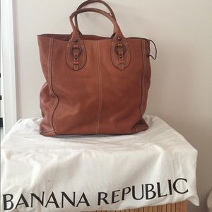 Tan leather and cotton shoulder bag.