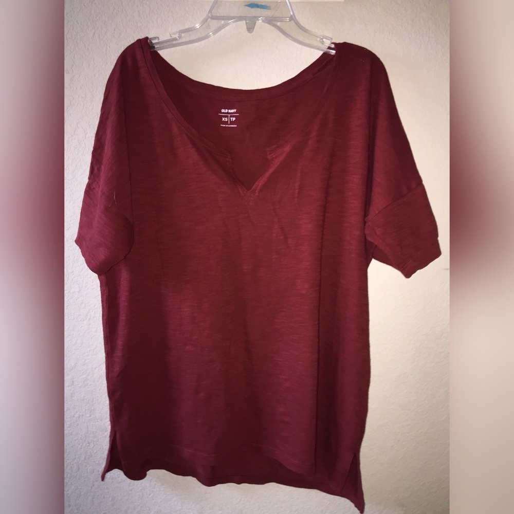 Red v neck designed top